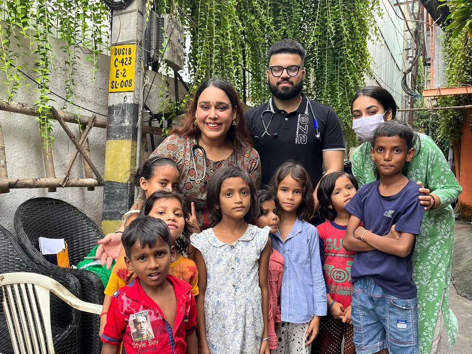 Tele-Upchaar doctors with children at an awareness campaign
